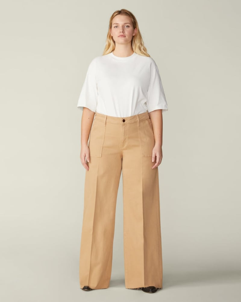 Front of a model wearing a size 14X33 Amanda High-Rise Wide-Leg Jeans in GRAIN by Warp + Weft. | dia_product_style_image_id:292986